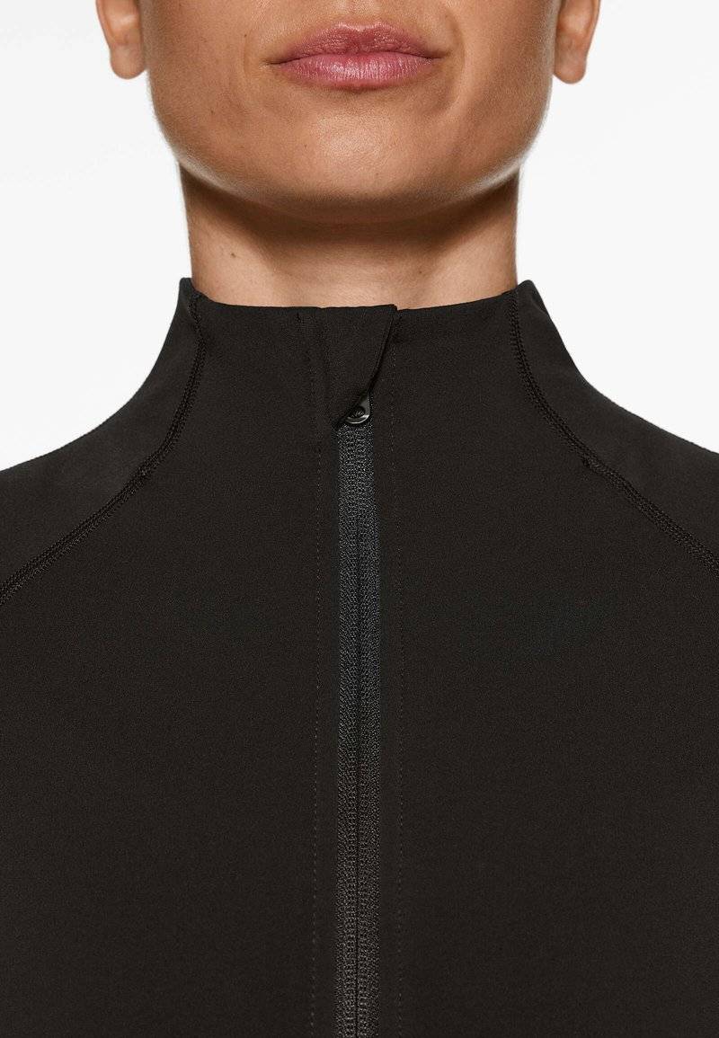 OYSHO OYSHO WARMTH COMFORTLUX TECHNICAL - Training jacket - black Lagerräumung