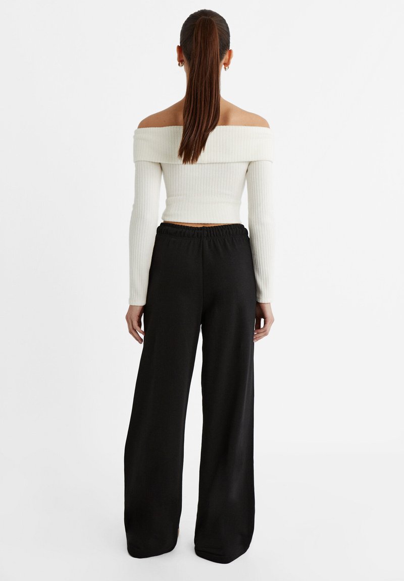Stradivarius Stradivarius WIDE-LEG JOGGER - Tracksuit bottoms - black Bis zu 55% Rabatt
