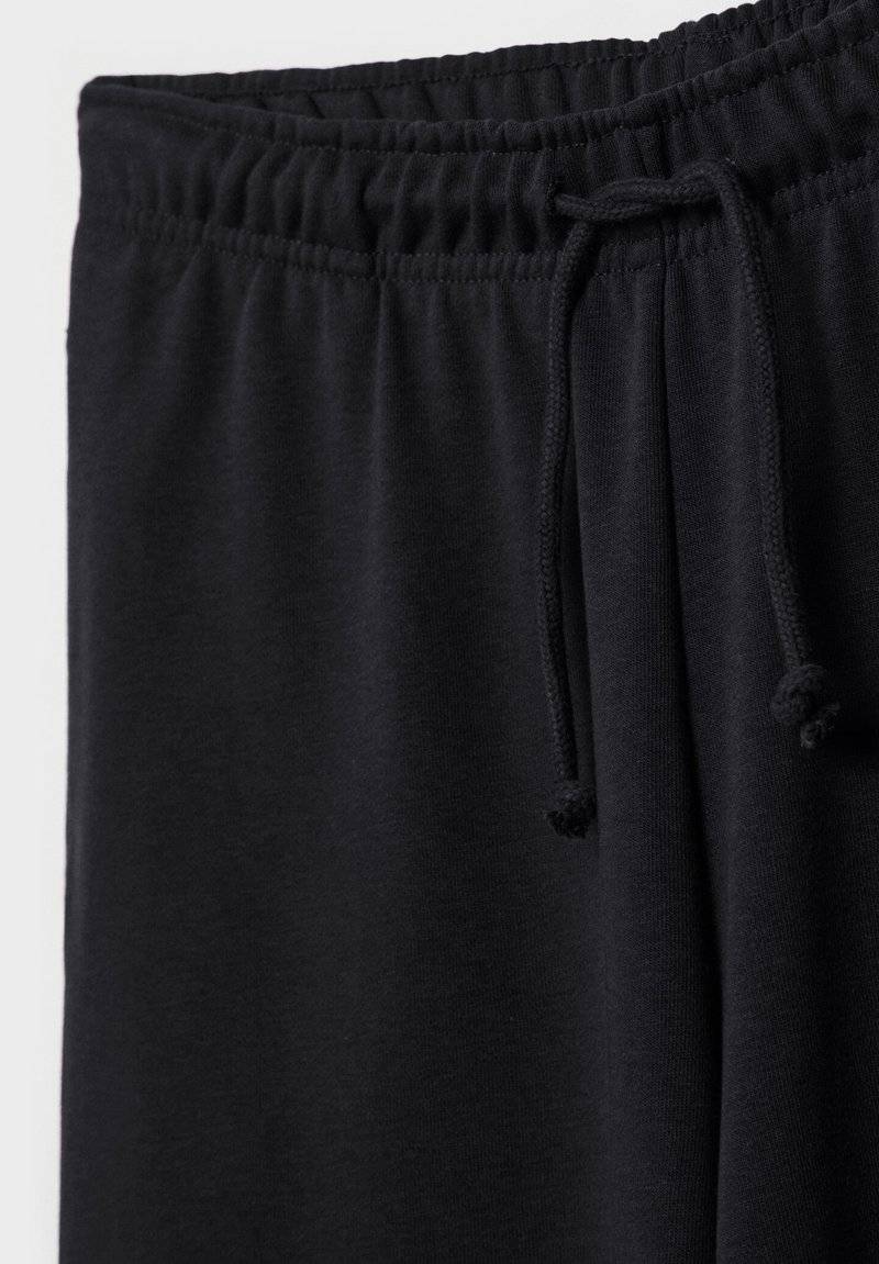 Stradivarius Stradivarius WIDE-LEG JOGGER - Tracksuit bottoms - black Bis zu 55% Rabatt
