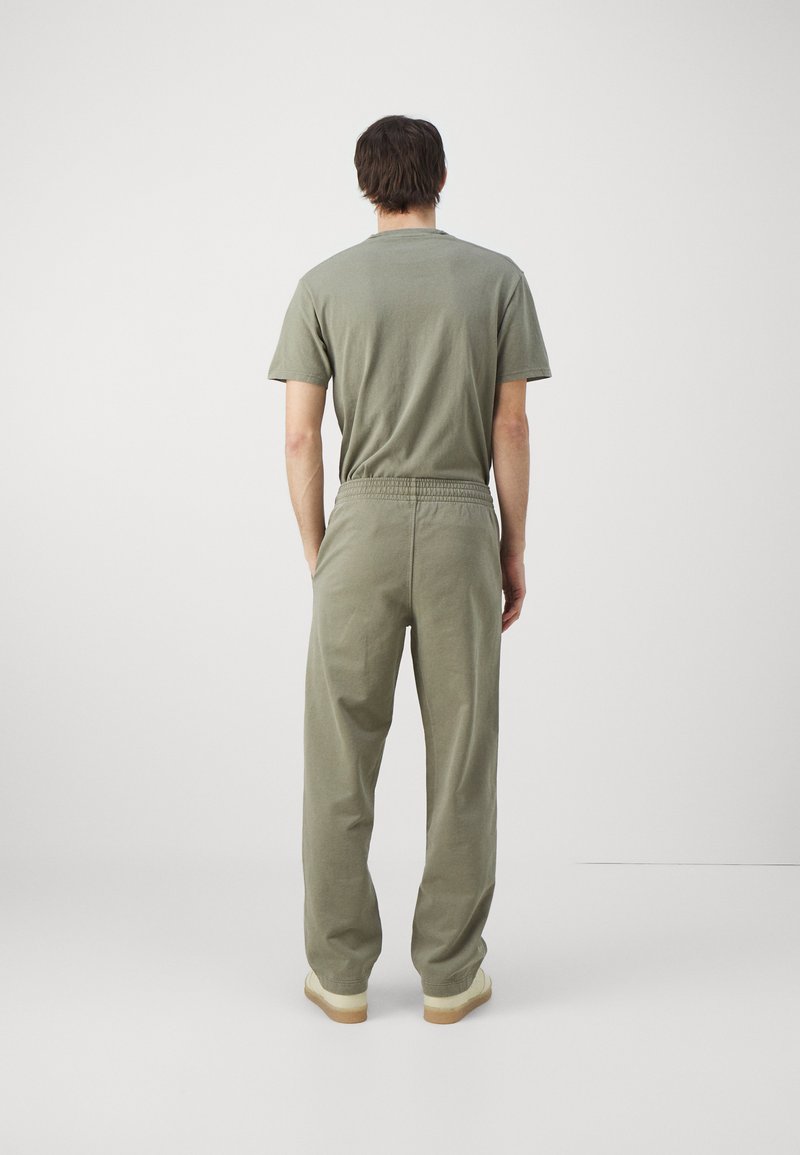 Holzweiler Holzweiler LAGOON OSLO TROUSERS UNISEX - Tracksuit bottoms - green Große Rabatte
