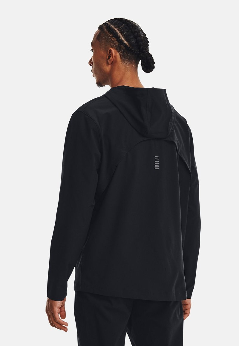 Under Armour Under Armour OUT THE STORM - Running jacket - black jet gray reflective Versandkostenfrei