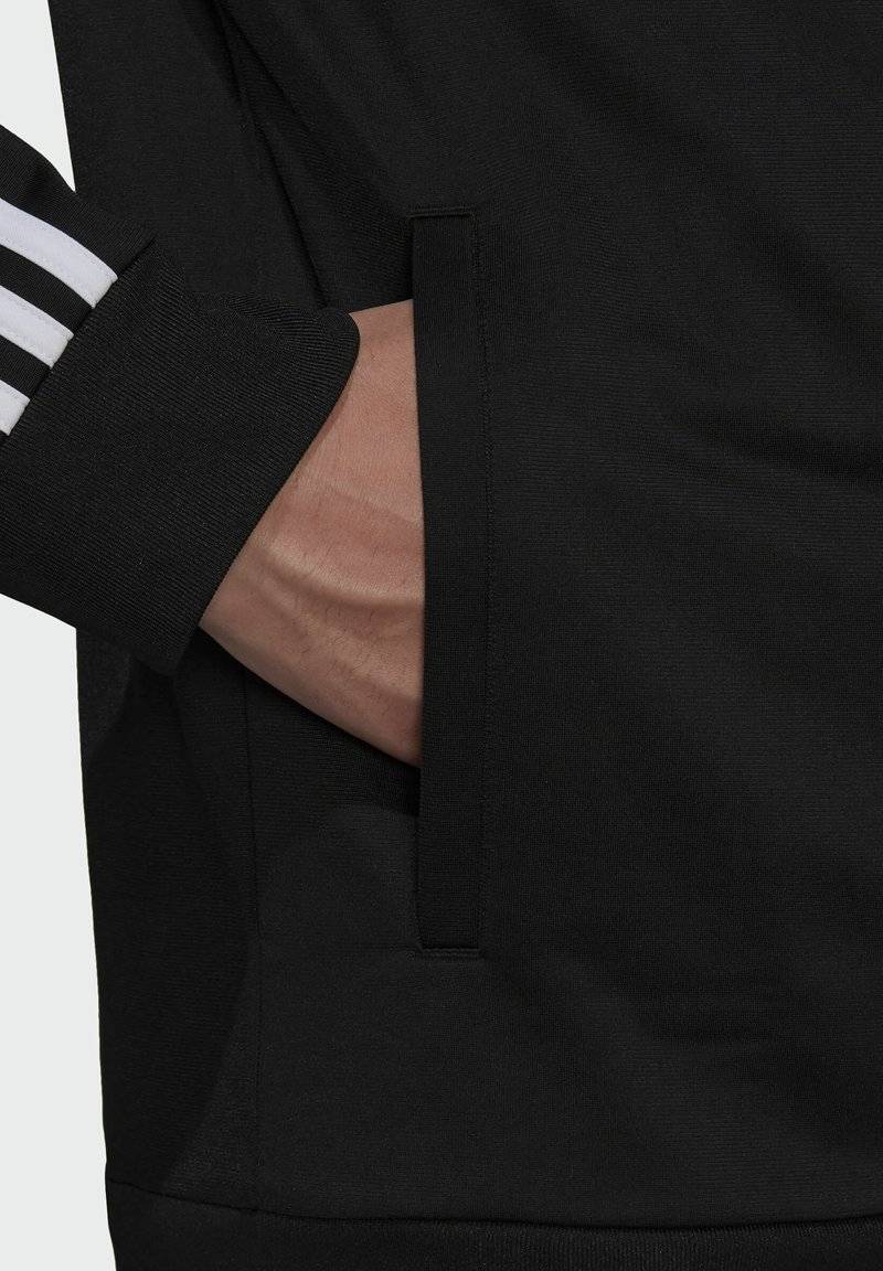adidas Sportswear adidas Sportswear ESSENTIALS WARM-UP REGULAR 3-STRIPES - Training jacket - black Valentinstagsangebot