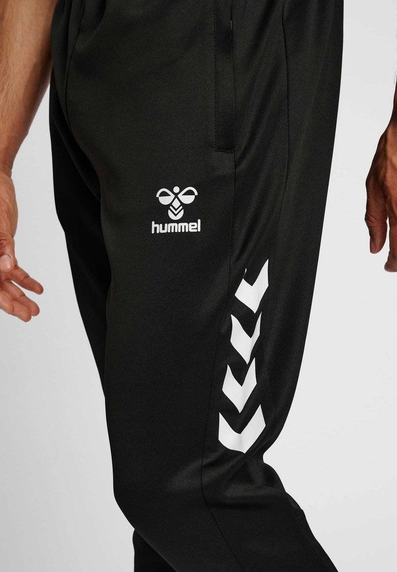 Hummel Hummel CORE XR TRAINING PANTS - Tracksuit bottoms - black Black Friday Preise