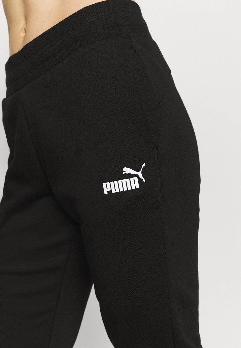 Puma Puma CAPRI - 3/4 sports trousers - black Bis zu 50% Rabatt