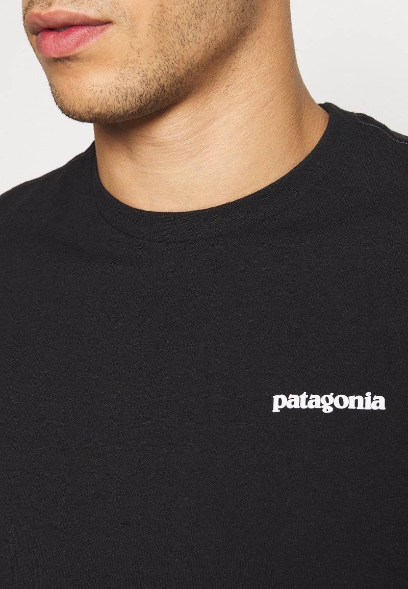 Patagonia Patagonia LOGO TEE - Print T-shirt - black Riesige Rabatte