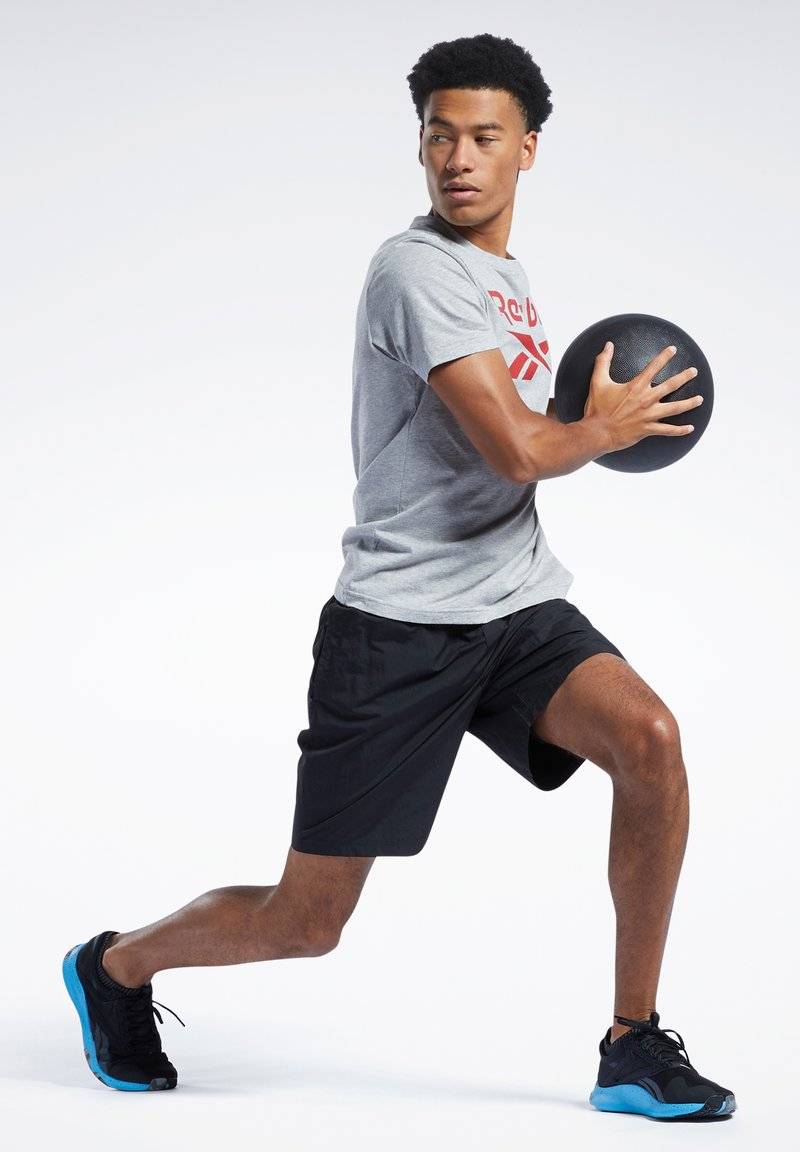 Reebok Reebok ID TRAIN UTILITY - Sports shorts - black Schlussverkauf