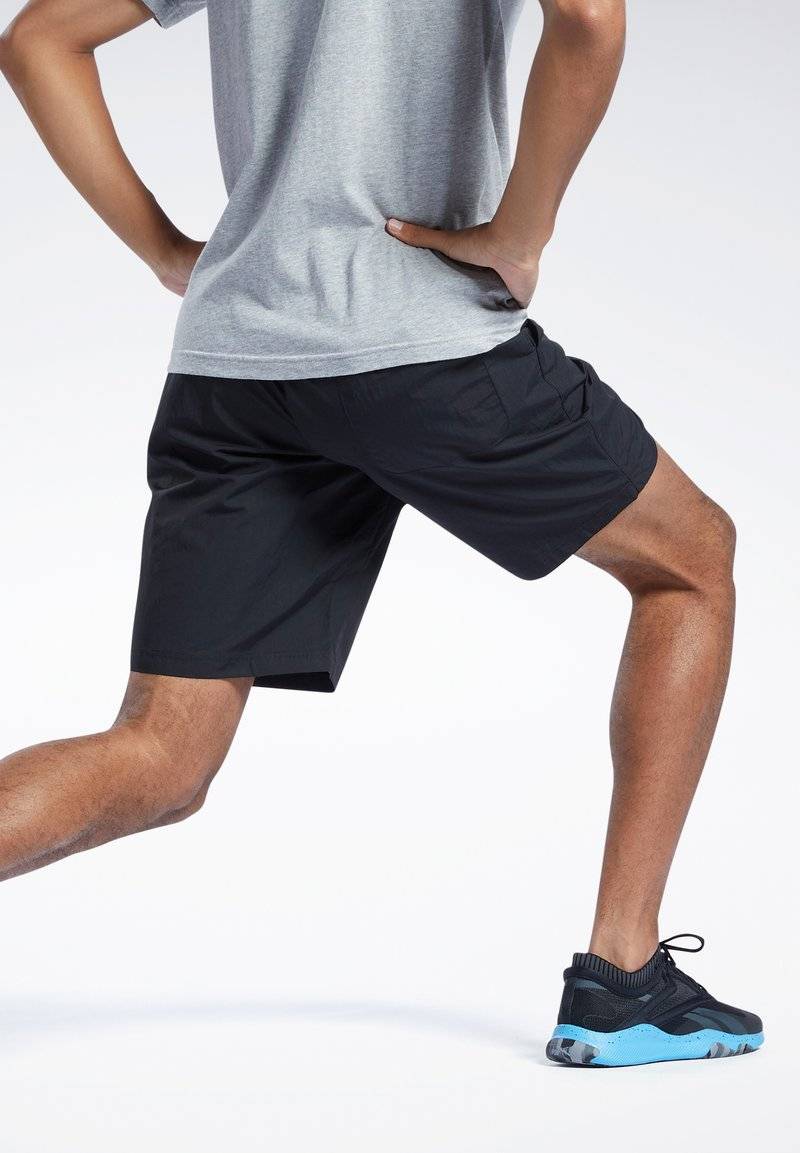Reebok Reebok ID TRAIN UTILITY - Sports shorts - black Schlussverkauf