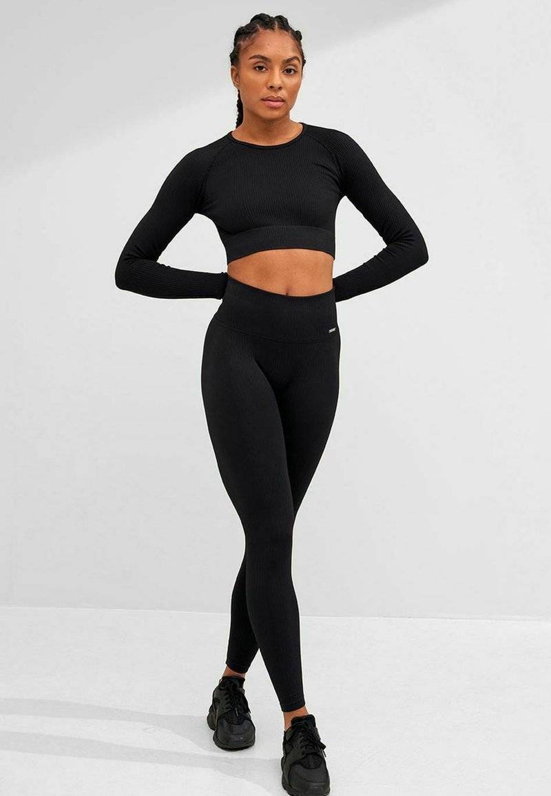 aim’n® aim’n® RIBBED SEAMLESS - Leggings - black Weihnachtsangebot