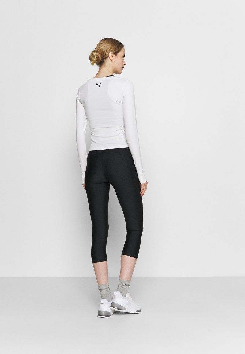 Under Armour Under Armour HI CAPRI - 3/4 sports trousers - black Vierteljährliche Förderung