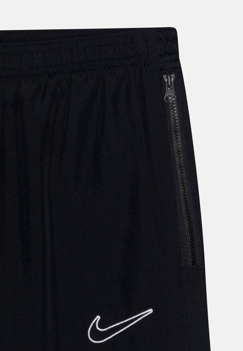 Nike Performance Nike Performance ACADEMY 23 TRACK PANT UNISEX - Tracksuit bottoms Valentinstagsangebot