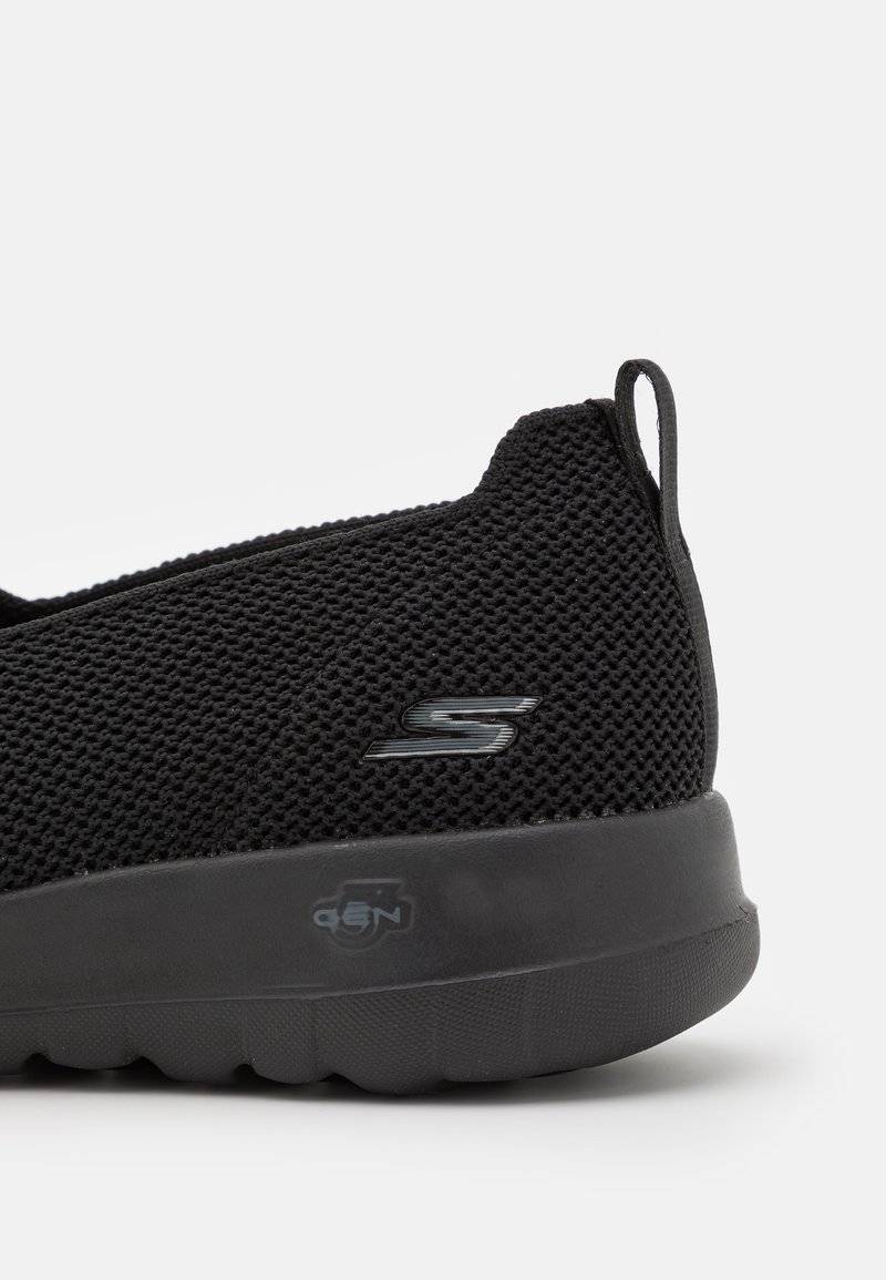 Skechers Performance Skechers Performance GO WALK SLIP ON - Walking trainers - black Weihnachtsangebot