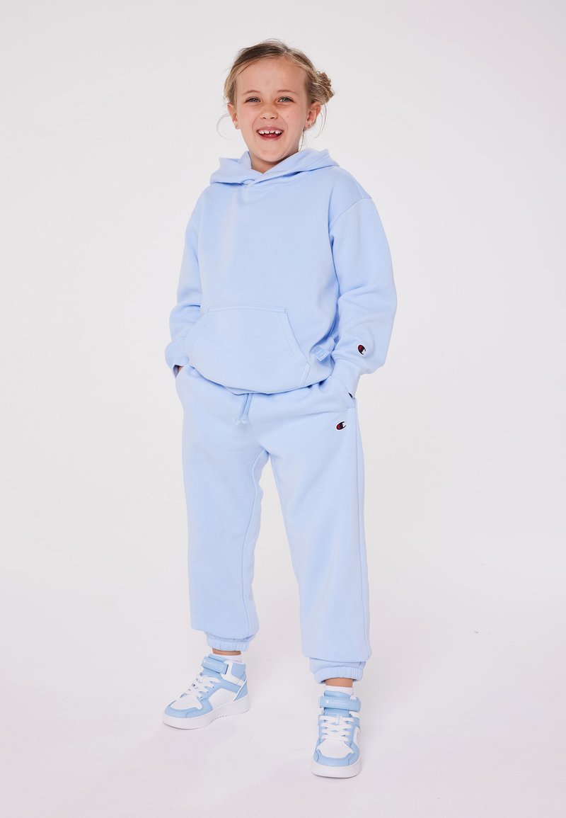 Champion Champion EXCLUSIVE PANT UNISEX - Tracksuit bottoms - light blue Exklusivangebot