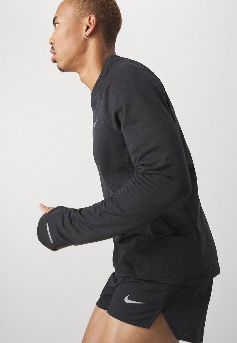 Nike Performance Nike Performance FAST SHORT - Sports shorts Blitzangebot