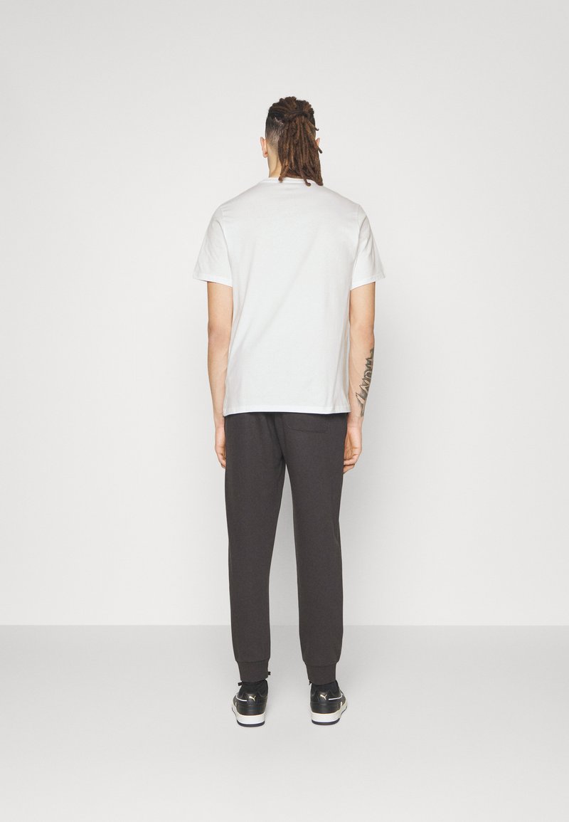 Converse Converse GO TO STAR CHEVRON TEE UNISEX - Print T-shirt - white Wochenangebot