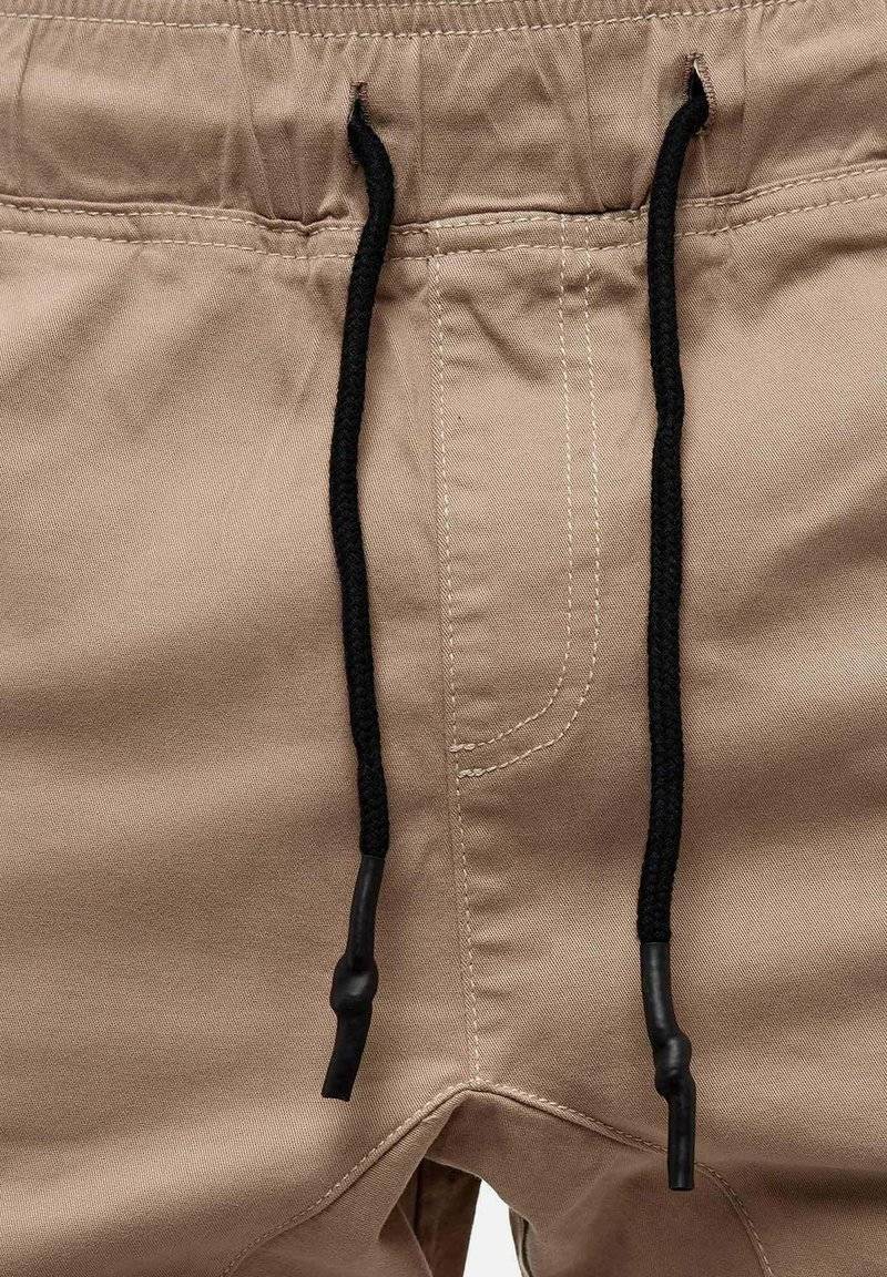 Tazzio Tazzio Cargo trousers - beige Tiefpreis