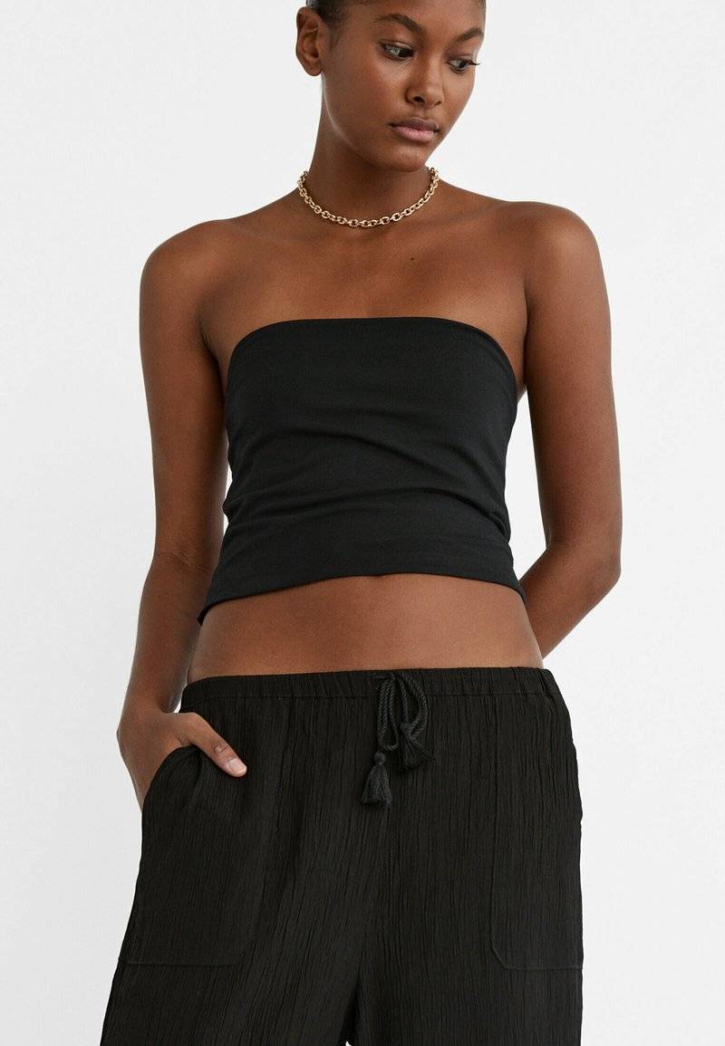 Stradivarius Stradivarius FLOWING CULOTTES - Trousers - black Super Rabatt