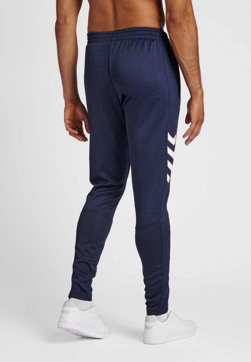 Hummel Hummel CORE XR TRAINING PANTS - Tracksuit bottoms - marine Speichern exportieren
