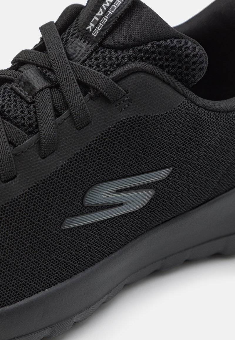 Skechers Performance Skechers Performance GO WALK BUNGEE - Walking trainers - black 2025